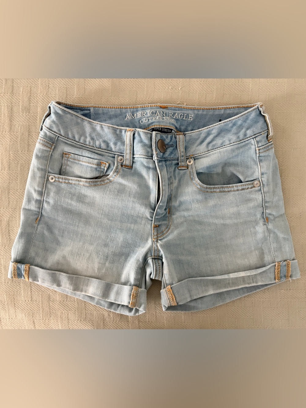 American Eagle Denim Shorts Low Rise Blue Wash Midi Stretch Cuffed Hem Size